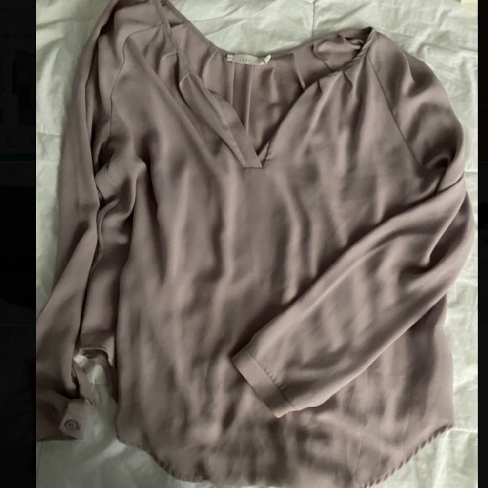 Dusty lavender blouse.